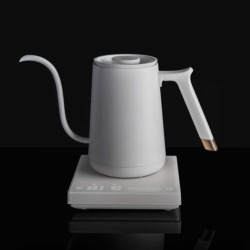 http://thecoffeeguy.store/cdn/shop/products/TIMEMORE-smart-mini-fish-electric-pour-over-kettle-600ml-220V-gooseneck-variable-kettle-temperature-control-hand.jpg_q50_f8005829-a742-475c-a08d-03bf8b287faa_1200x1200.jpg?v=1611582228